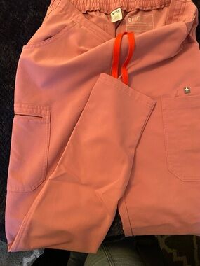 FIGS Rose Pink Scrub Pants with Orange Drawstring